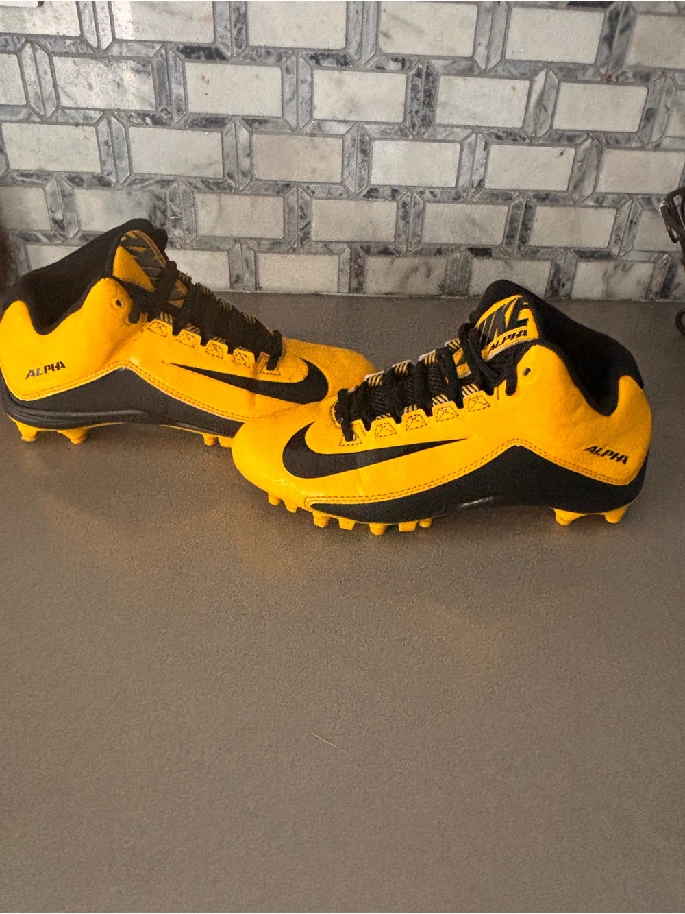 Nike Alpha pro high top youth cleats